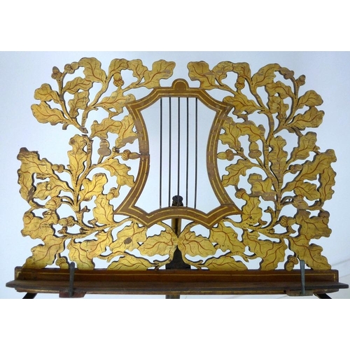 905 - A Regency painted wood and toleware music stand, circa 1820, fretwork carved stand with central styl... 