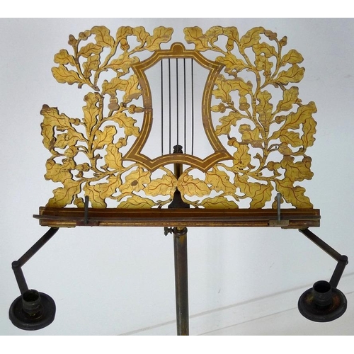 905 - A Regency painted wood and toleware music stand, circa 1820, fretwork carved stand with central styl... 