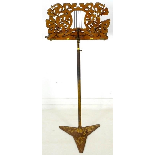 905 - A Regency painted wood and toleware music stand, circa 1820, fretwork carved stand with central styl... 