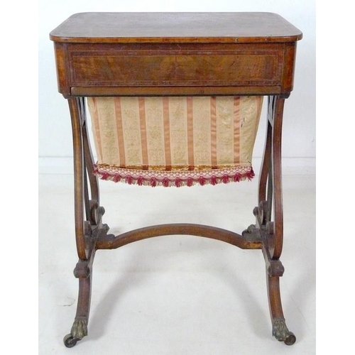 908 - An early 19th century mahogany worktable, inlaid with satinwood and crossbanded, with pull out uphol... 