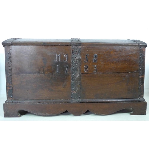 909 - An 18th century oak domed blanket chest with original intricate key, metal bound on a matched base, ... 