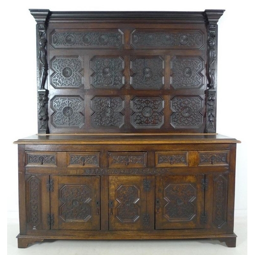 918 - An oak dresser base, parts 18th century and later, frieze carved 'Jacobvs Rex 1688', two wide and on... 