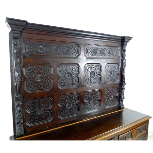 918 - An oak dresser base, parts 18th century and later, frieze carved 'Jacobvs Rex 1688', two wide and on... 