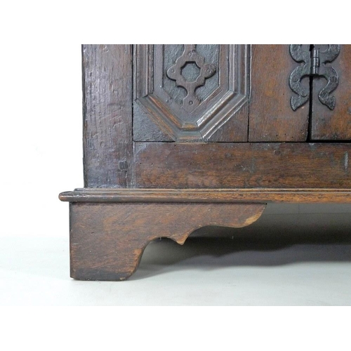 918 - An oak dresser base, parts 18th century and later, frieze carved 'Jacobvs Rex 1688', two wide and on... 