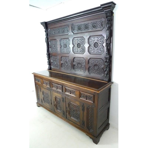 918 - An oak dresser base, parts 18th century and later, frieze carved 'Jacobvs Rex 1688', two wide and on... 