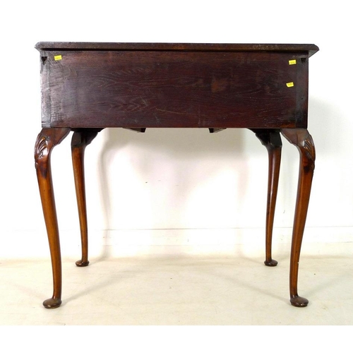 922 - A mahogany and inlaid side table in the Queen Anne style, early 20th century, with quarter veneered ... 