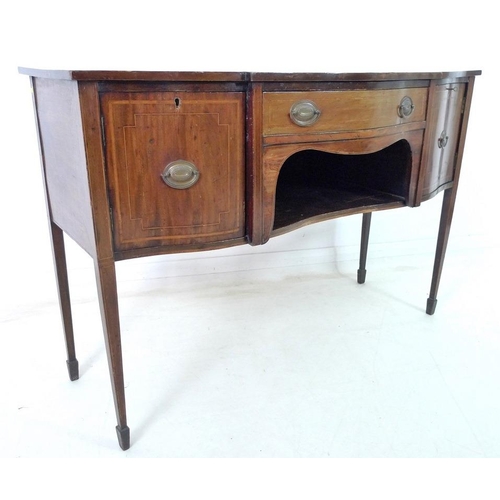 923A - A George III mahogany, line inlaid and crossbanded sideboard, with serpentine shaped front, cupboard... 