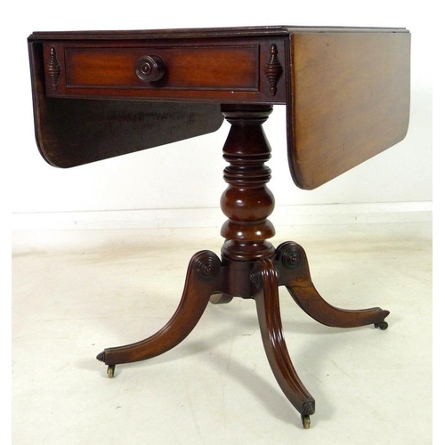 925 - A Regency mahogany sofa table, drop leaves, single drawer opposite false drawer with turned handle, ... 