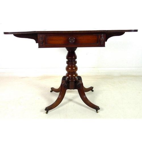 925 - A Regency mahogany sofa table, drop leaves, single drawer opposite false drawer with turned handle, ... 