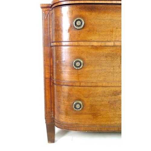 927 - A George IV mahogany, crossbanded and inlaid bow fronted chest of three graduating drawers, with bra... 