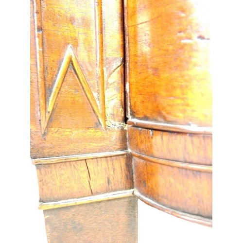 927 - A George IV mahogany, crossbanded and inlaid bow fronted chest of three graduating drawers, with bra... 