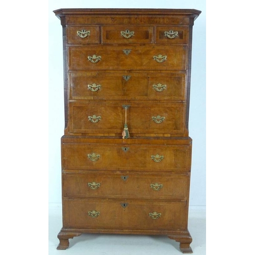 930 - A George I walnut and crossbanded tallboy chest on chest, the top section with three short over thre... 