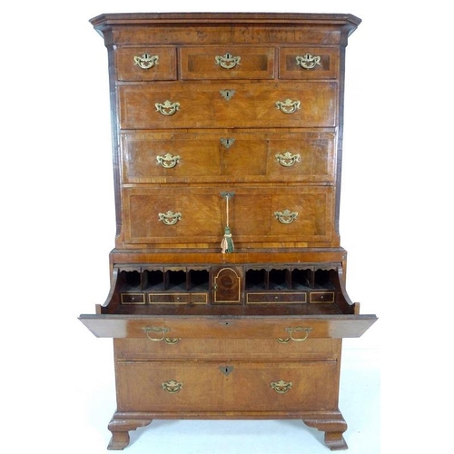 930 - A George I walnut and crossbanded tallboy chest on chest, the top section with three short over thre... 