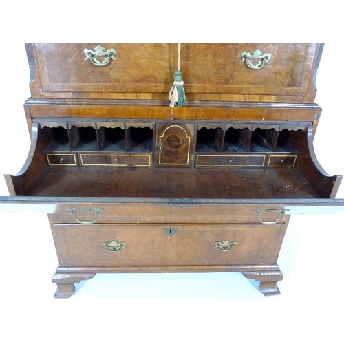 930 - A George I walnut and crossbanded tallboy chest on chest, the top section with three short over thre... 