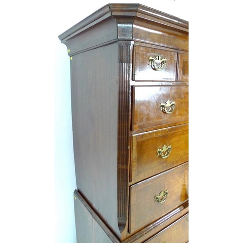 930 - A George I walnut and crossbanded tallboy chest on chest, the top section with three short over thre... 