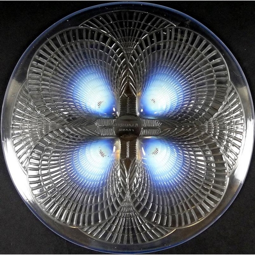 501 - A Rene Lalique 'Coquilles' plate, circa 1920, the underside quartered with four moulded opalescent s... 