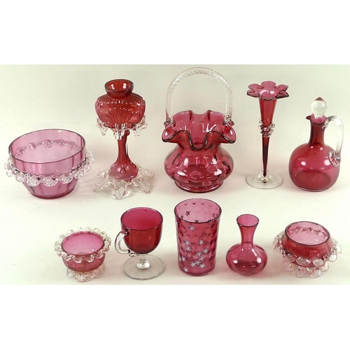 518 - A collection of cranberry glass, Victorian and later, comprising basket shaped dish with ruffled edg... 