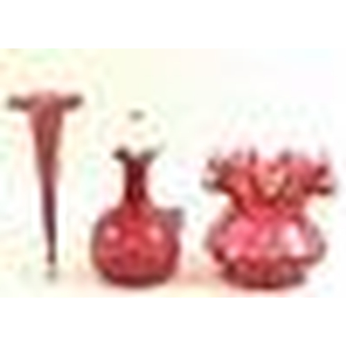 518 - A collection of cranberry glass, Victorian and later, comprising basket shaped dish with ruffled edg... 