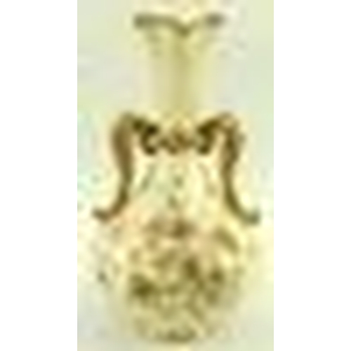 533 - A large Royal Worcester blush ivory twin handled vase, the body painted with chrysanthemums, with gi... 