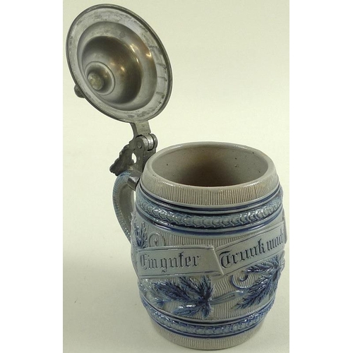 536 - A Westerwald salt glazed grey stoneware tankard with pewter cover, 13.5cm, and a German stoneware ju... 