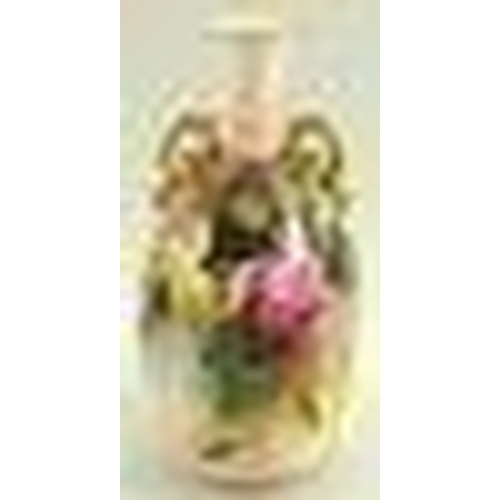 543 - A Royal Worcester double handled vase of lobed form with gilded scrolled vine handles, the body pain... 