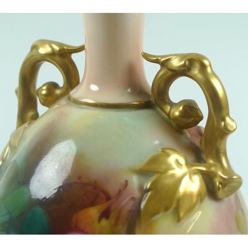 543 - A Royal Worcester double handled vase of lobed form with gilded scrolled vine handles, the body pain... 