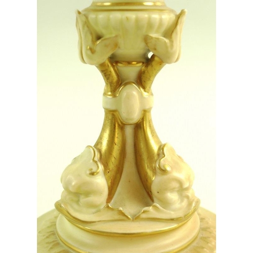 549 - A Royal Worcester blush ivory handled vase, the lobed form body painted with roses, forget-me-nots a... 