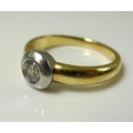An 18ct gold and diamond bi-coloured ring, diamond approx 0.3ct, millennium hallmark, 5.8g.