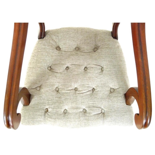 950 - A pair of 19th century open armed library chairs, by Gillows, shaped backs with scroll arms, the sea... 