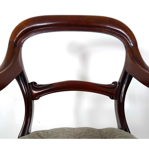 950 - A pair of 19th century open armed library chairs, by Gillows, shaped backs with scroll arms, the sea... 