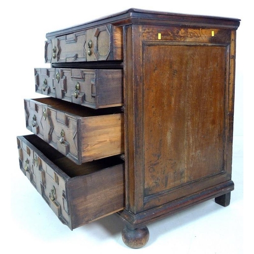 1008 - An early 18th century oak chest of four drawers, in the Commonwealth style with geometric moulding, ... 