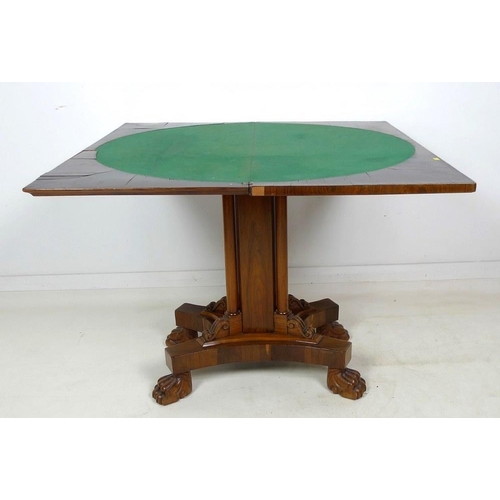 1013 - A Victorian rosewood card table, with crossbanded decoration to the fold over surface, inset with ba... 