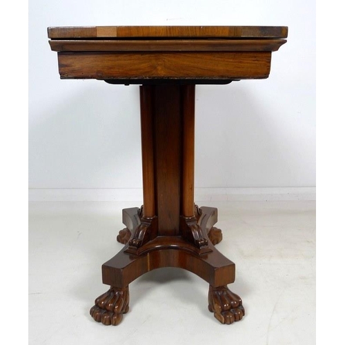 1013 - A Victorian rosewood card table, with crossbanded decoration to the fold over surface, inset with ba... 