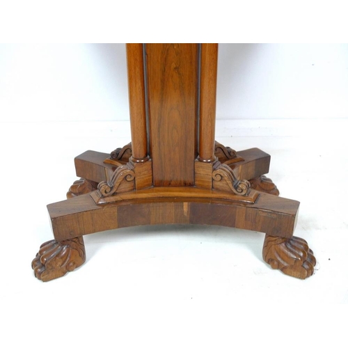 1013 - A Victorian rosewood card table, with crossbanded decoration to the fold over surface, inset with ba... 