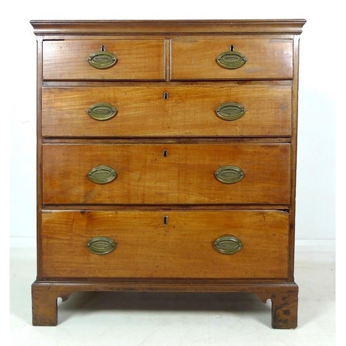 1019 - A George III mahogany chest of two short over three long graduating drawers, with brass oval plate h... 