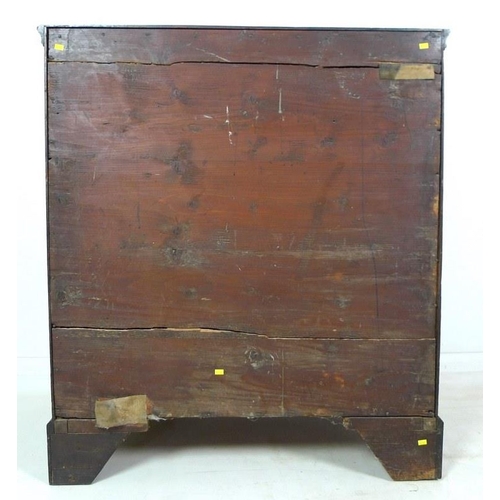 1019 - A George III mahogany chest of two short over three long graduating drawers, with brass oval plate h... 