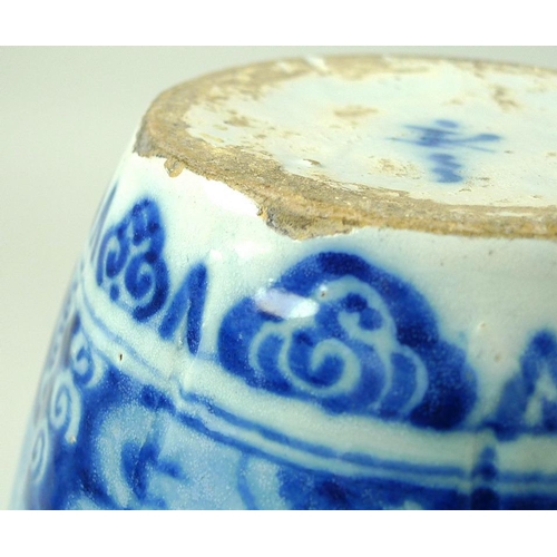 502 - A pair of Dutch Delft blue and white tin glazed pottery vases, 18th century, of lobed octagonal form... 