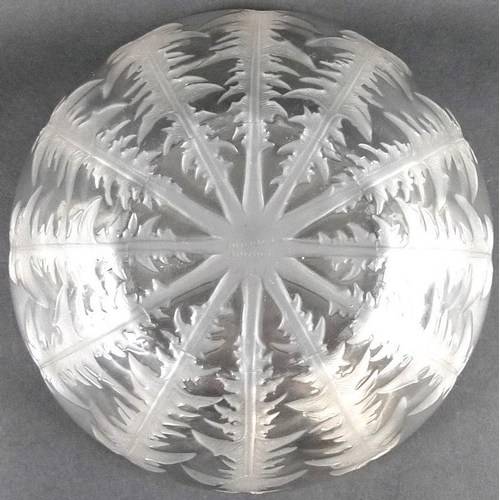 506 - A Lalique opalescent glass bowl, in the Pissanlit pattern, depicting dandelions, signed to the base,... 