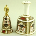 A Royal Crown Derby bell complete with clapper 13.5cm tall and a smaller silent bell, 12cm tall, eac... 