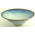 Will Illsley (British, b. 1948): a studio pottery conical cowl with graduated blue and cream glaze b... 