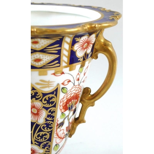 512 - A Royal Crown Derby ewer of slimline gourd form, 26cm high, together with a twin handled pedestal va... 