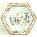 A Chinese porcelain famille rose hexagonal dish, Qing Dynasty, early 19th century, moulded with incu... 