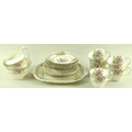 A Crown Staffordshire teaset in the Summer Glory pattern, comprising five tea cups, six saucers, fiv... 