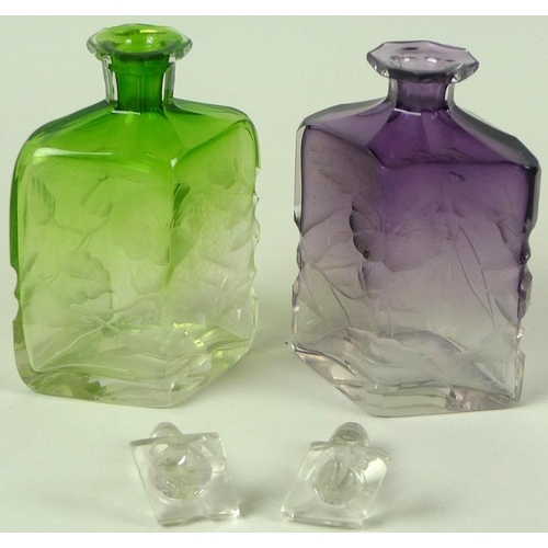 516 - Attributed to Ludwig Moser (1833-1916): a pair of Bohemian Intaglio cut glass decanters and stoppers... 