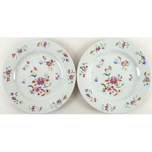 518 - A pair of Chinese export porcelain plates, late 19th century, with shaped rims, decorated in famille... 