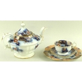 A late Victorian tea set in blue and peach palette on white ground and with gilt detailing, comprisi... 