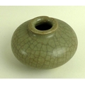 A rare Chinese stoneware jar, Sung / Song Dynasty (960-1279), of flattened ovoid form with flared ri... 