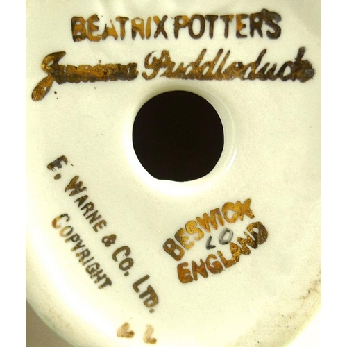 538 - A collection of Beatrix Potter collectibles, comprising two Beswick figurines, Jemima Puddleduck and... 