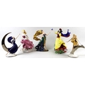 A collection of Franklin Mint porcelain figurines, modelled as ladies, comprising Starlight in Plati... 