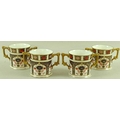 Four Royal Crown Derby loving cups in the Imari pattern number 1128, 7.5cm. (4)
